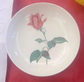 Vintage bowl with rose